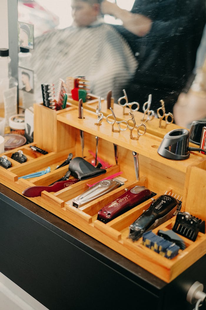 A neat arrangement of barber tools and equipment at a barbershop, highlighting professional grooming essentials.